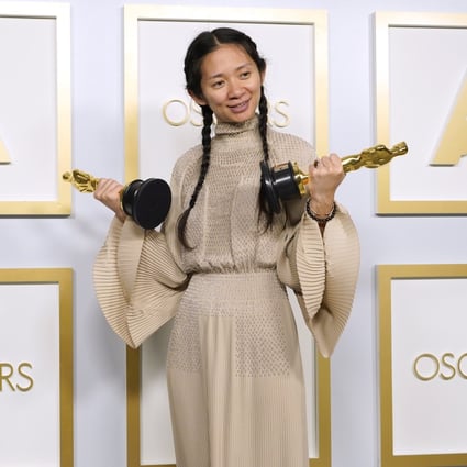 Chloé Zhao with her Oscars for best picture and director for Nomadland. Photo: AP