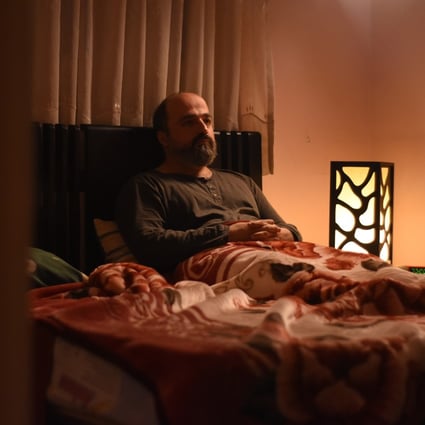 Ehsan Mirhosseini in a still from There Is No Evil (category: IIA, Persian), directed by Mohammad Rasoulof. Kaveh Ahangar and Baran Rasoulof co-star.