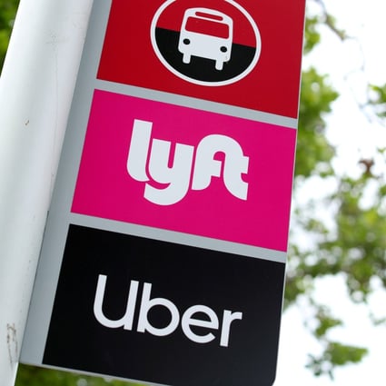 A sign marks a rendezvous location for Lyft and Uber users at San Diego State University in San Diego, California. Photo: Reuters