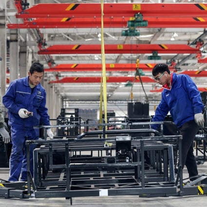For the January-March period, industrial firms’ profits rose 137 per cent from the same period a year earlier to 1.825 trillion yuan. Photo: AFP