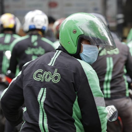 A GrabBike driver in Indonesia in 2018. Grab is set to become the most valuable publicly listed technology company from Southeast Asia following a blockbuster merger with a special purpose acquisition company. Photo: AP 