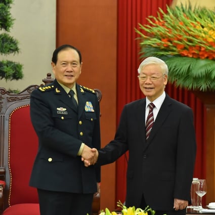 China’s Defence Minister Wei Fenghe (left) meets Vietnam’s Communist Party General Secretary Nguyen Phu Trong in Hanoi on Monday. Photo: Xinhua