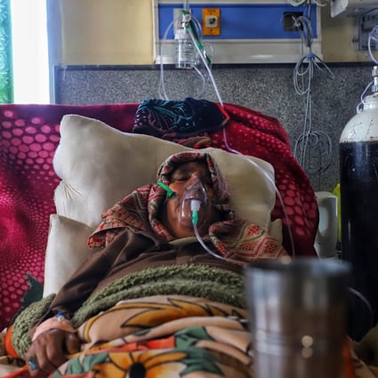 An woman receives oxygen at a Covid-19 centre. Photo: TNS