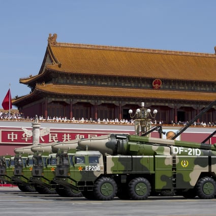 Chinese military vehicles carrying DF-21D anti-ship ballistic missiles pass Tiananmen Gate during a military parade to commemorate the 70th anniversary of the end of World War II, in Beijing. Photo: AP