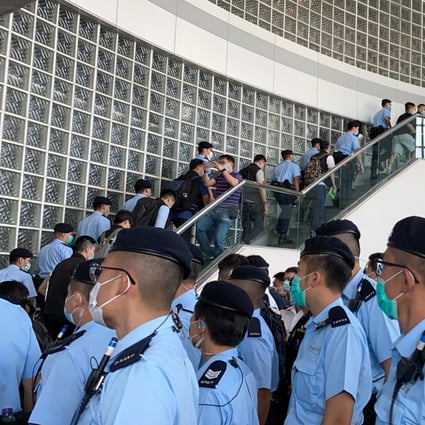 Hong Kong police raid the offices of the Apple Daily newspaper after arresting its founder Jimmy Lai Chee-ying on suspicion of foreign collusion. Photo: Now TV