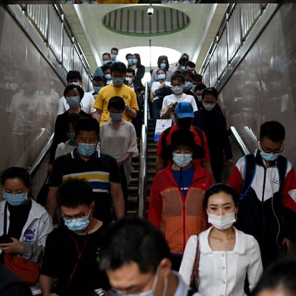 Subway commuters during rush hour in Beijing on June 2. Ground down by the sapping realities of modern city life, China’s youth are “lying flat”, the latest buzzword for those tapping out of a culture of endless work with little reward. Photo: AFP