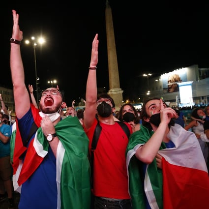 Spectators in Rome watch the Uefa Euro 2020 football match between Italy and Turkey on Friday. Photo: LaPresse via ZUMA Press/dpa