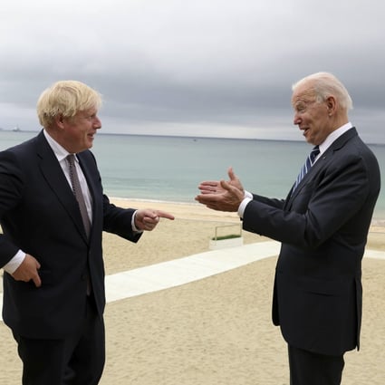 British Prime Minister Boris Johnson shares a light moment with US President Joe Biden in Carbis Bay, Cornwall, Britain, on June 10. The two on Thursday agreed to work to resume travel between the two countries and signed a new Atlantic Charter. Photo: Handout via Xinhua