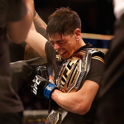 UFC flyweight champion Brandon Moreno of Mexico celebrates after defeating Deiveson Figueiredo at UFC 263. Photo: AFP