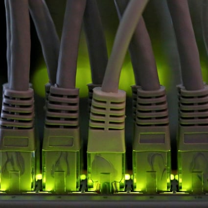 LAN network cables are plugged into a bitcoin mining computer server. Photo: Reuters