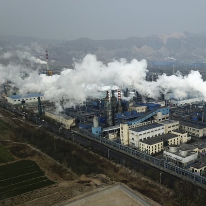 Smoke and steam rise from a coal processing plant in Hejin in central China’s Shanxi province. China is the world’s largest emitter of carbon dioxide. Photo: AP Photo
