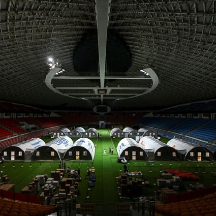New mobile laboratories for nucleic acid testing have been set up inside Guangzhou Gymnasium, following the recent outbreak of the coronavirus disease in Guangzhou, Guangdong province. Photo: Reuters