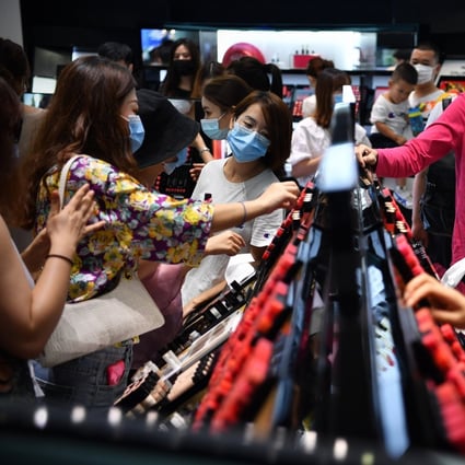 People shop at a duty-free shopping mall in Sanya, in China’s Hainan province, in October 2020. Foreign companies have been keen to tap China’s consumer market, but geopolitical tensions have complicated the picture. Photo: Xinhua