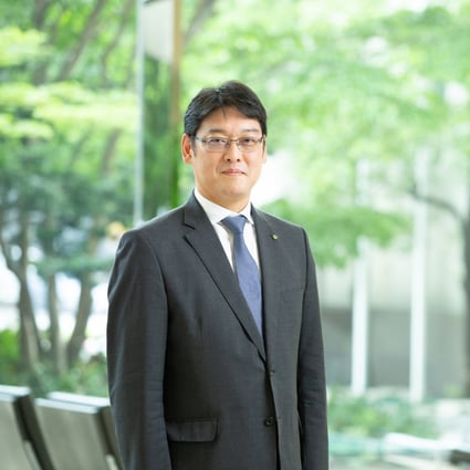 Kentaro Taki, president.