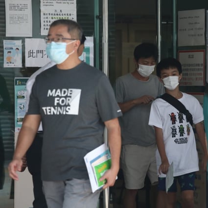 People leave after being given the BioNTech vaccine at Lai Chi Kok Park Sports Centre. Photo: Jonathan Wong