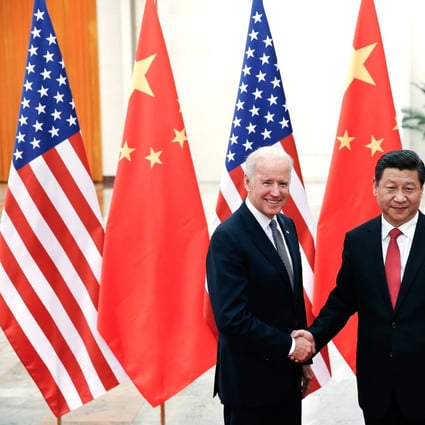 US President Joe Biden with Chinese President Xi Jinping in Beijing in 2013. Photo: TNS