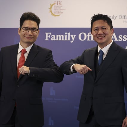Joseph Chan Ho-lim, undersecretary for Financial services and the Treasury (left), and Kwan Chi-man, chairman of the Family Office Association Hong Kong, attend the association’s opening ceremony at the InvestHK office in Admiralty on November 18, 2020. Photo: Nora Tam