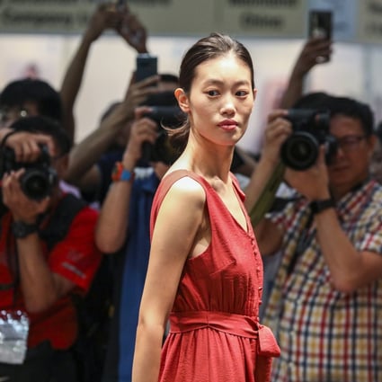 A model poses on the runway during Hong Kong Fashion Week on July 8, 2019. While it might be a tall order for Hong Kong to build a clothing brand that can rival the market giants, the city remains a major trendsetter in the region. Photo: Nora Tam 