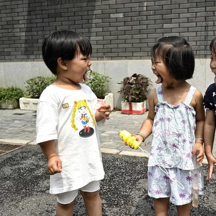 Families with children must be given solid policy and social support so that more couples are encouraged to have babies. Photo: AFP 