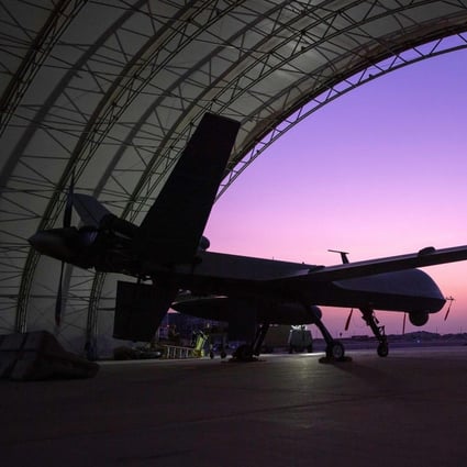 A US Air Force MQ-9 Reaper remotely piloted aircraft awaits an engine test prior to an intelligence, surveillance, and reconnaissance operation at Ali Al Salem Air Base, Kuwait, in 2019. Photo: US Air Force / AFP
