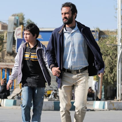 Amir Jadidi (right) in a scene from A Hero, directed by Iranian auteur Asghar Farhadi.