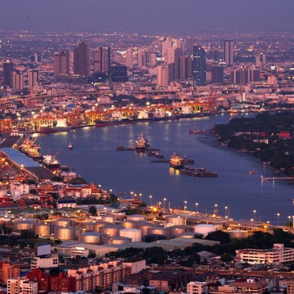 A view of Bangkok’s port along the Chao Phraya River at sunset on June 2. Thailand has been promoting its homegrown Sufficiency Economy Philosophy (SEP) as an alternative approach to achieving UN Sustainable Development Goals. Photo: Reuters 