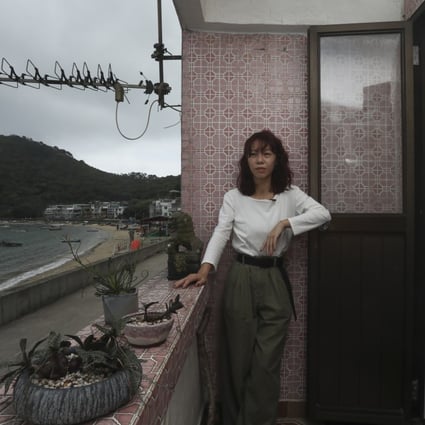 Kodi Wan in her flat in Peng Chau, Hong Kong. She believes in living a minimalist life and encourages people to buy less and swap items they don’t need for others that they do. Photo: Jonathan Wong
