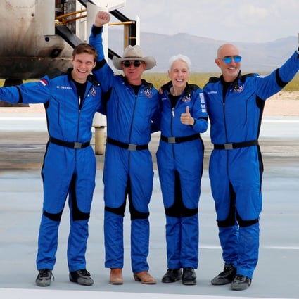 Jeff Bezos was one of four passengers on the world’s first unpiloted suborbital flight, blasted off into zero gravity by his own New Origins space tourism firm on July 20. Photo: Reuters
