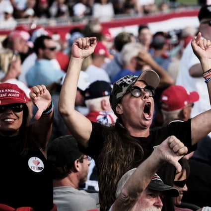A Trump supporter screams at members of the press during a “Save America” rally by ex-president Donald Trump in Ohio on June 26. Photo: Bloomberg