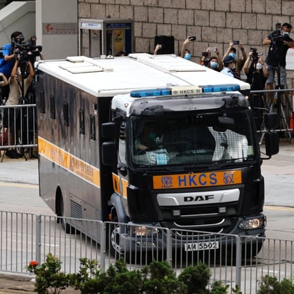 A prison van carrying Tong Ying-kit, the first person charged under the new national security law, leaves the High Court after Tong was sentenced to nine years in prison on July 30. Photo: Reuters