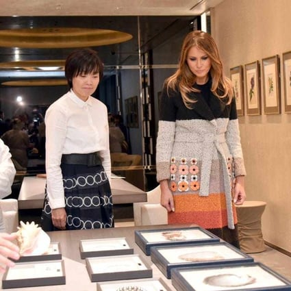 Melania Trump and Japan’s first lady, Akie Abe, who gave Melania a pair of pearl earrings – just one of many gifts she received. Photo: AP
