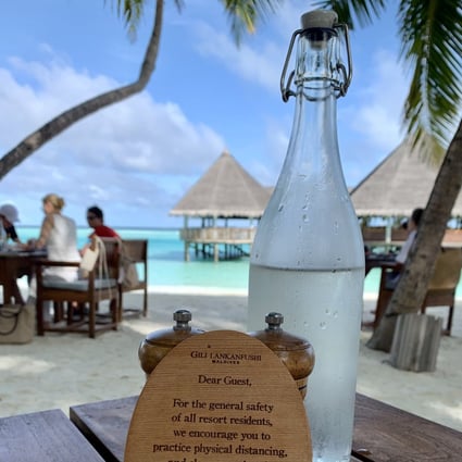 This discreet notice to guests at Gili Lankanfushi in the Maldives is one of the few reminders of the coronavirus pandemic - unless, like our reporter, you go island-hopping and endure multiple Covid-19 tests. Photo: Lee Cobaj