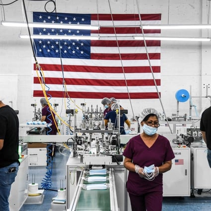 Employees make respiratory masks in a family-owned factory in Miami, Florida, on February 15. As overall demand for PPE collapses, a newly formed American Mask Manufacturers Association has begun pleading for protection, particularly against Chinese “dumping”. Photo: AFP
