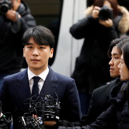Seungri, then still a member of South Korean K-pop band Big Bang, arrives to be questioned at the Seoul Metropolitan Police Agency in March 2019. Photo: Reuters