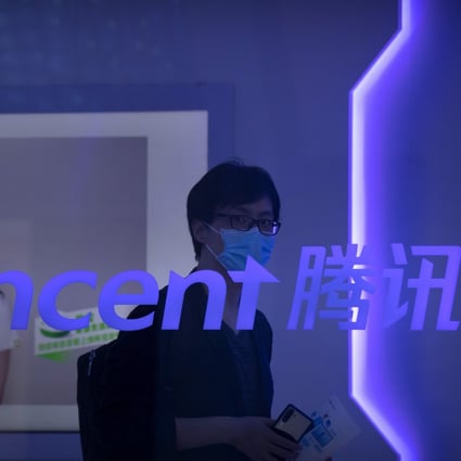 A visitor walks past a logo for Tencent at its display at the China International Fair for Trade in Services in Beijing on September 5, 2020. Foreign shareholders in China’s tech companies are learning what its entrepreneurs have long known: Beijing’s decisions about what is good for the economy can hurt corporate bottom lines. Photo: AP