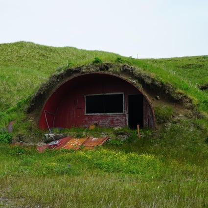 A Cold War-era bunker, one of many that dot hillsides across Adak Island, Alaska. Visitors to the remote island can explore the decaying relics, the dozens of military facilities left behind in 1997, and the island’s stunning countryside. Photo: AP