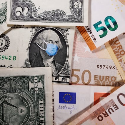 A masked George Washington on a US dollar note next to euro banknotes. Carry trades, which have been dormant since the global financial crisis, are set to come back in a big way. Photo: Reuters