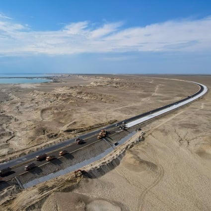 An aerial view of a construction site for a cross-desert expressway in Xinjiang, China, on July 16. China has launched its first batch of Reits, focused on the infrastructure sector. Photo: Xinhua