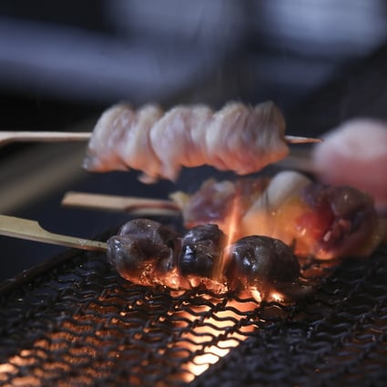 Yakitori being grilled at Yokai at H Queen’s in Central. Photo:  Jonathan Wong