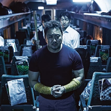 Ma Dong-seok (front) and Gong Yoo in a still from Train to Busan (2016). The Korean zombie apocalypse hit will be remade by Hollywood, and fans of the original aren’t happy.