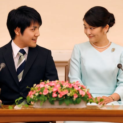 Princess Mako, the elder daughter of Prince Akishino and Princess Kiko, and her fiancé Kei Komuro, a university friend of Princess Mako, smile during a press conference to announce their engagement at Akasaka East Residence in Tokyo, Japan, in September 2017. Photo: Reuters