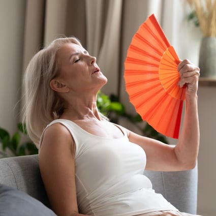 Hot flashes are one of many symptoms women can experience while going through menopause, with others including night sweats, vaginal dryness, weight gain, insomnia, migraines, and feeling anxious and irritable. Photo: Getty Images/iStockphoto