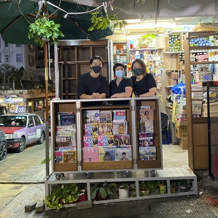 As part of the “Via North Point” project, artists at Cou Tou Woodworking Studio designed a new display cabinet for a woman surnamed Ng (centre), who has run a news stand in the area for more than two decades, which saves her nearly two hours of labour a day. Photo: Hong Kong Arts Centre