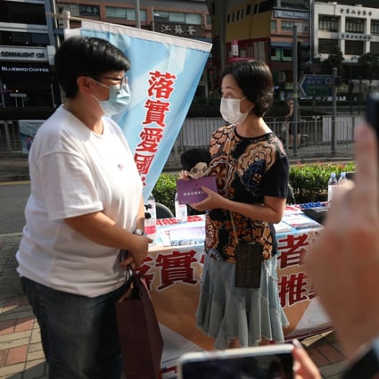 Shun Tak Holdings chairwoman Pansy Ho talks to a supporter in Sheung Wan on September 11. Photo: Xiaomei Chen