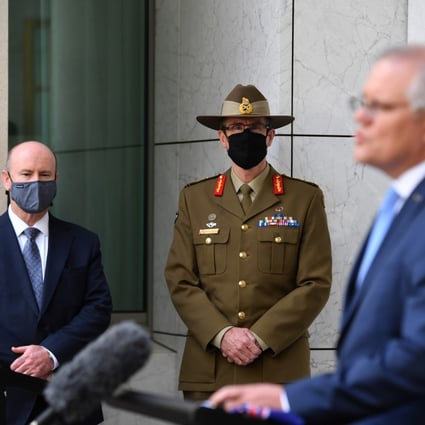 (From the left) Australian Defence Secretary Greg Moriarty, Chief of the Australian Defence Force General Angus Campbell and Prime Minister Scott Morrison at a press conference at Parliament House in Canberra, on September 16. Photo: AAP