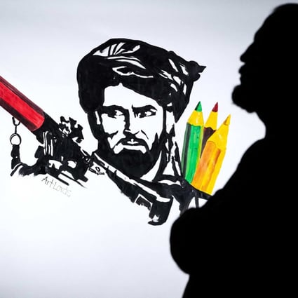 Co-founder of the ArtLords collective, Farshad, next to a drawing of his collective, representing a Taliban fighter whose rocket launcher is filled with pencils. Afghan artists are planning to resist the new regime by taking their work online and out on the streets. Photo: AFP