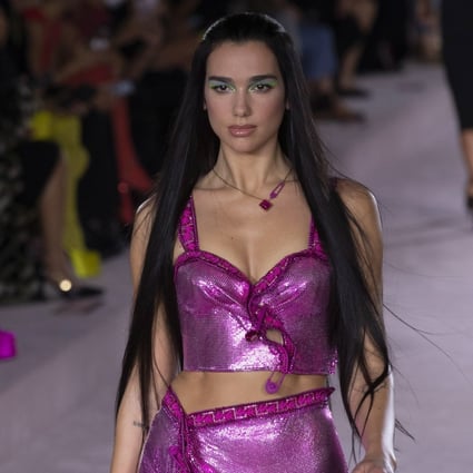 Dua Lipa walked the runway during Versace’s women’s spring/summer 2022 show at Milan Fashion Week on September 24. Photo: EPA-EFE