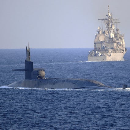 The guided-missile submarine USS Georgia, a nuclear-powered model that Australia might soon deploy, transits the Strait of Hormuz on December 21, 2020. Photo: TNS