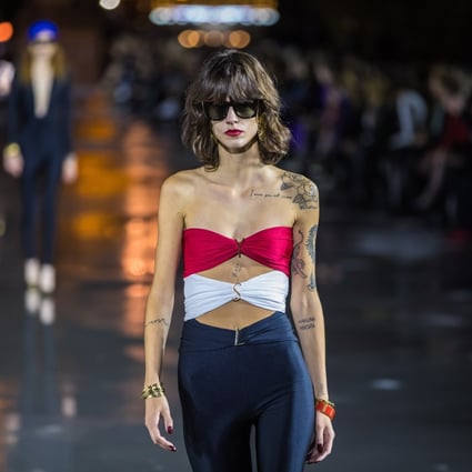 Yves Saint Laurent’s womenswear spring/summer 2022 presentation at Paris Fashion Week mixed classicism with a fierce street vibe. Photo: EPA-EFE