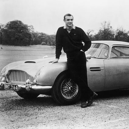 Sean Connery on the set of Goldfinger (1964) with his character James Bond’s famous 1964 Aston Martin DB5. Photo: Bettmann Archive